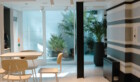 Picture of a table looking out to the atrium of the Common Room